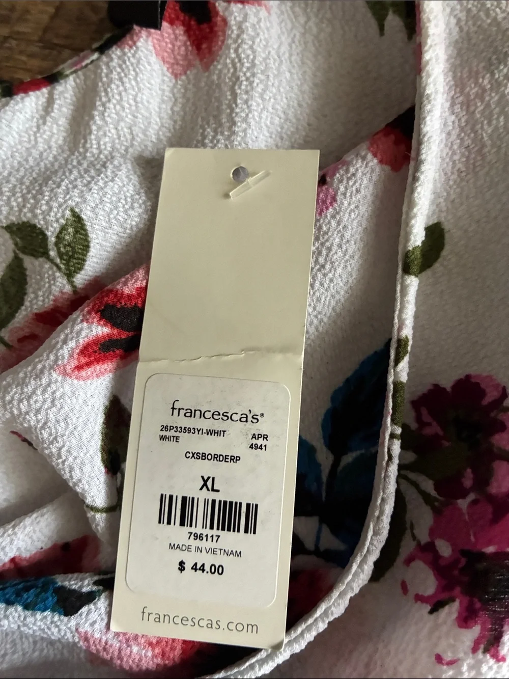Francesca's Collections White Floral Romper with Pink & Blue Accents